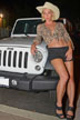 cowgirl in front of jeep