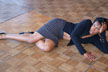 girl lying on wood floor