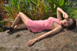 girl lying on rock