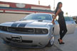 girl next to dodge challenger