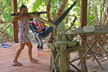 girl milling rice