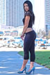 girl standing in front of skyscrapers