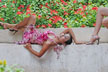 girl lying on bench