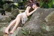 quyen rests on rock